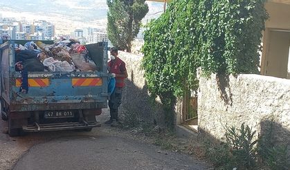 Mardin'de bir evden 2 kamyon çöp çıkarıldı